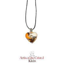 Load image into Gallery viewer, Pendentif Coeur en Cristal 25 mm. Cordon noir effet cuir réglable (50/55 cm)  Le modèle se décline en différents coloris :  Orange/brun/blanc
